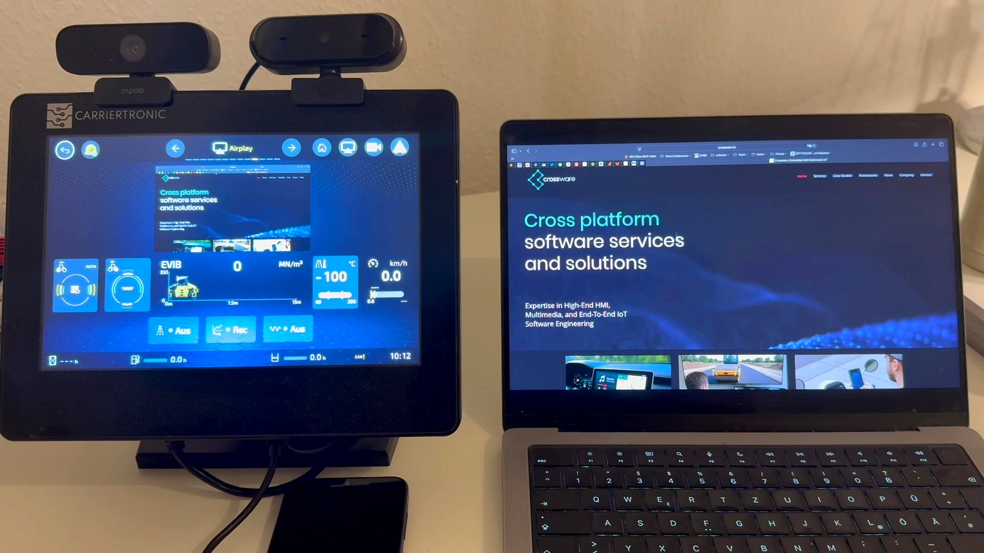 CrossPlay AirPlay integration, MacBook content projected to embedded display and mirrored simultaneously